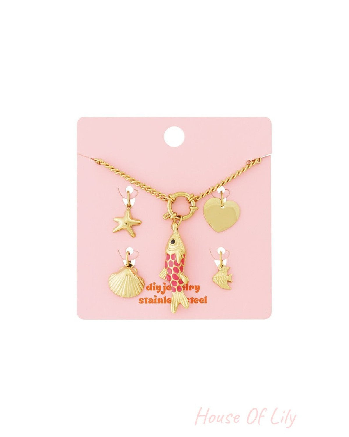 Gold rope chain bracelet on pink backing, featuring gold charms: starfish, scallop shell, heart, and pink-spotted fish.
