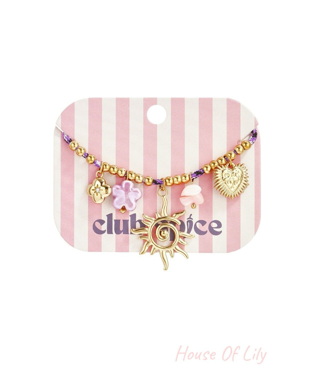 Golden charm bracelet on a pink striped card, featuring a sunburst pendant, flower, and heart charms on a beaded cord.