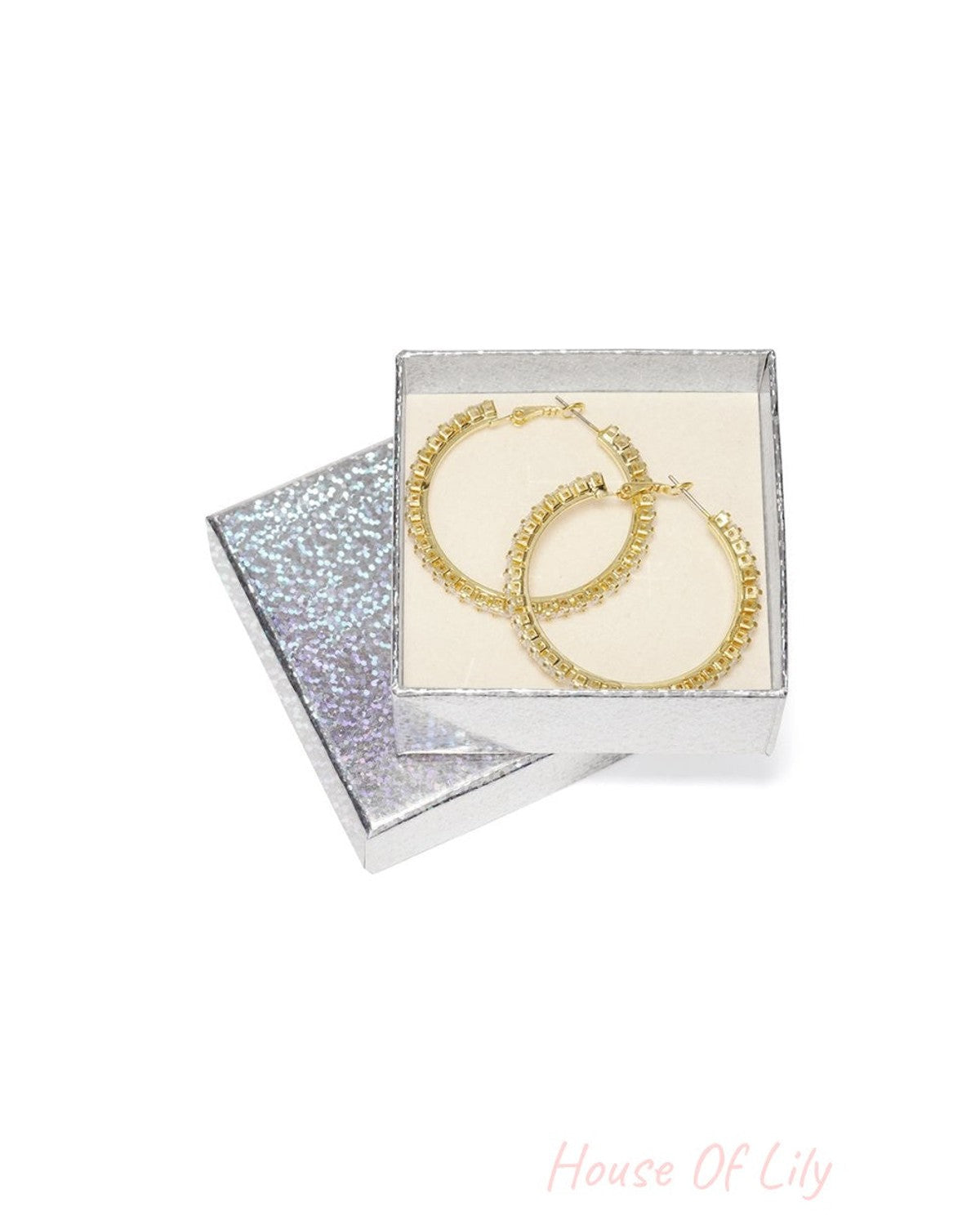 Glazed Aura Shimmer Loops: gold-toned rhinestone hoop earrings displayed in a shimmering silver gift box.