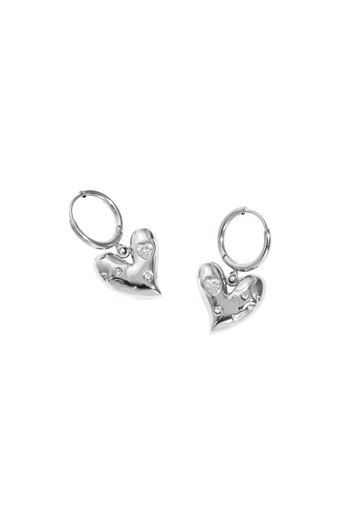 Pair of silver heart charm drop hoop earrings with rhinestone accents on white background