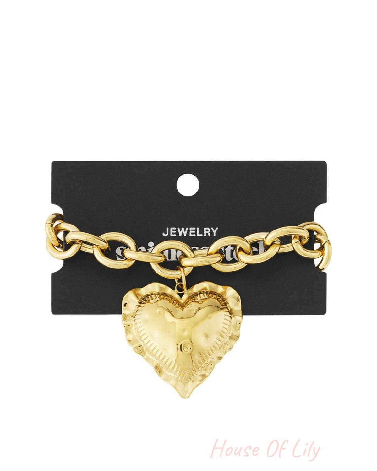 Gold-tone chunky link chain bangle featuring a large, textured heart pendant with a ruffled edge on a display card.