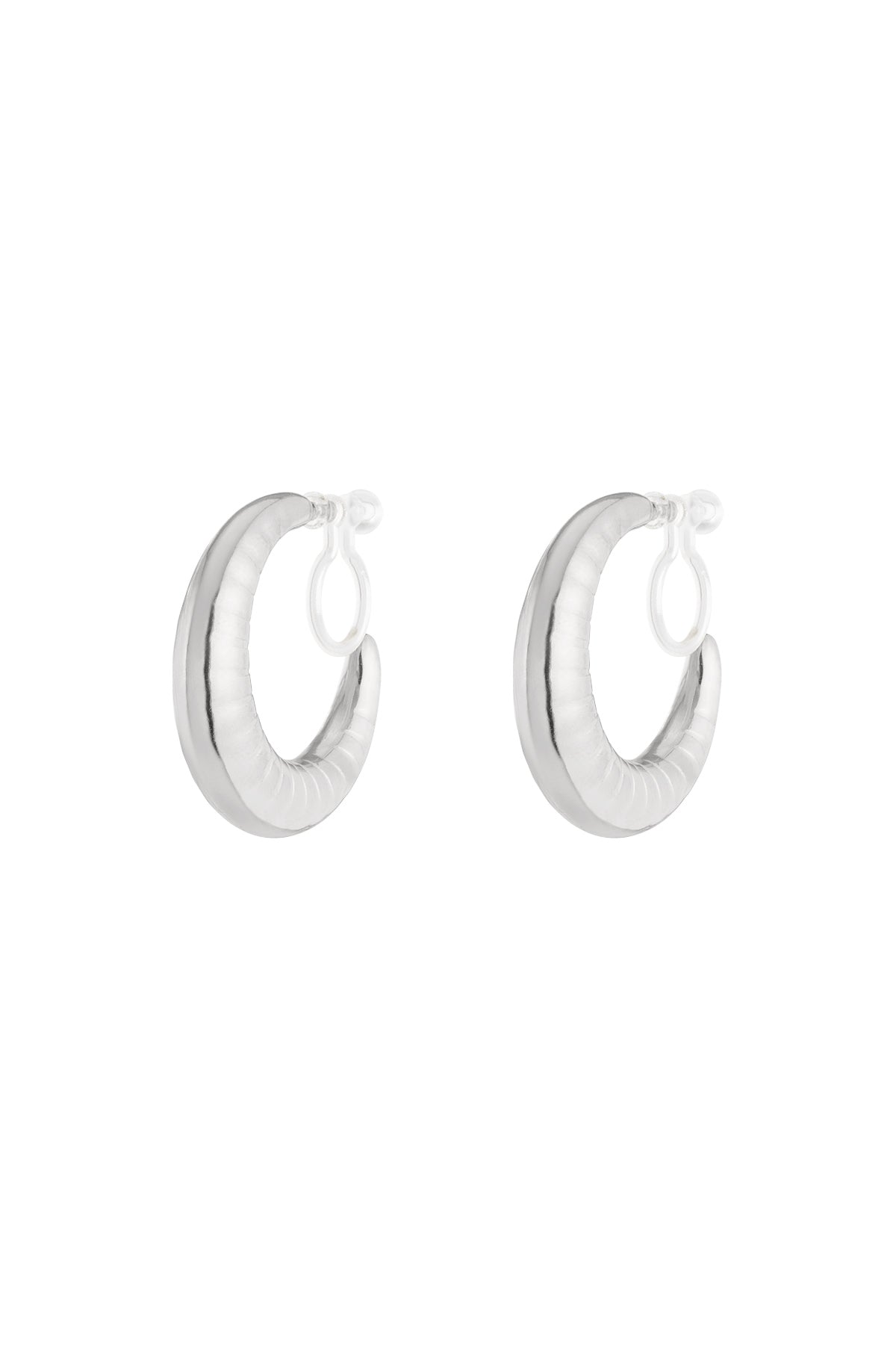 Pair of chunky silver clip-on hoop earrings with ripple texture on white background