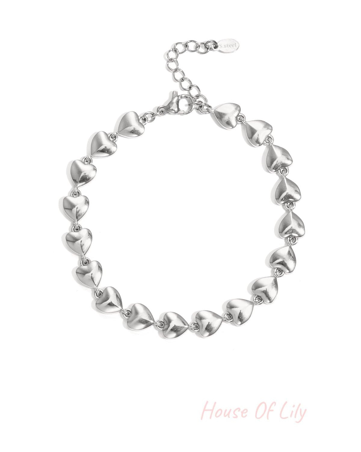 Silver-color chain bracelet featuring linked three-dimensional heart shapes on white background