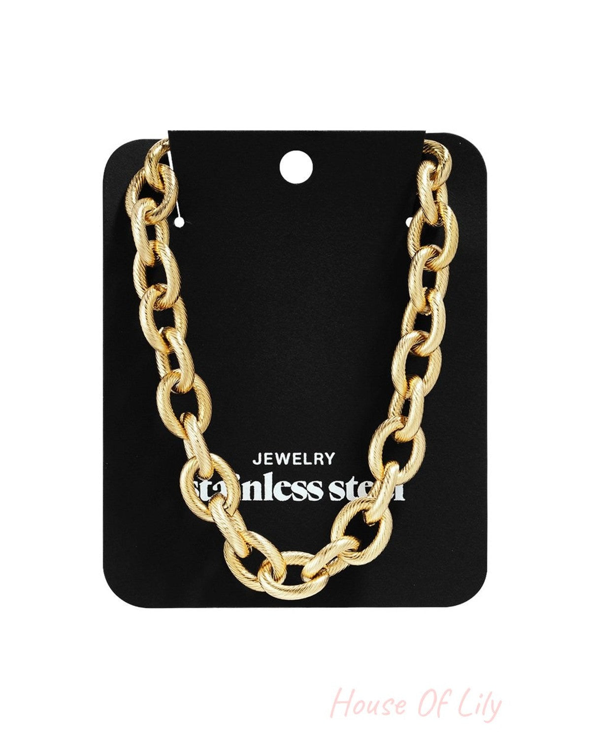 Golden Hour Drip gold-toned chunky chain link necklace with a textured finish, displayed on a black stainless steel card.