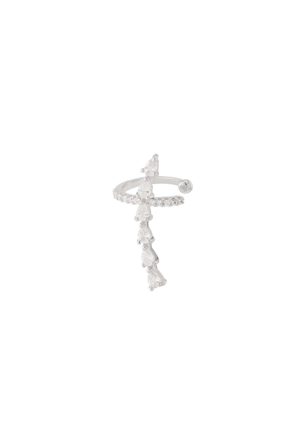 Silver tone ear cuff with cascading pear-shaped cubic zirconia stones on a white background