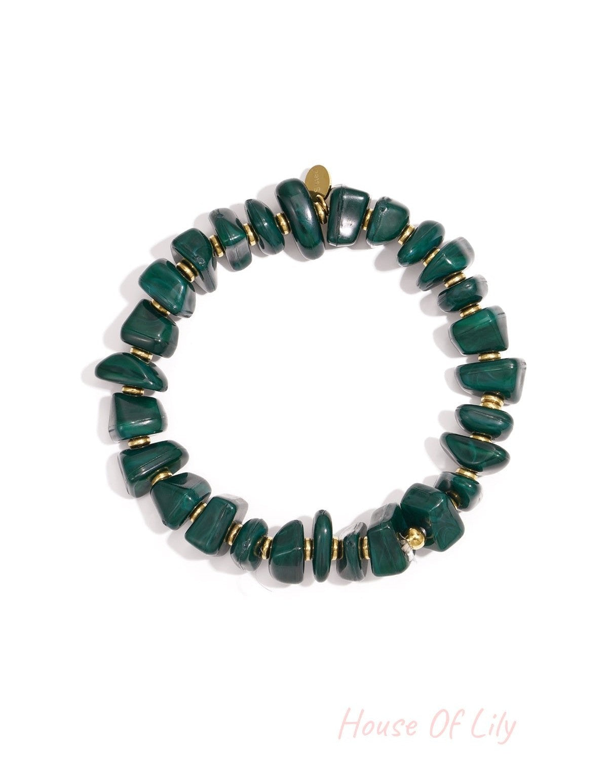 Forest green chunky beaded stretch bracelet with gold spacers displayed in circle
