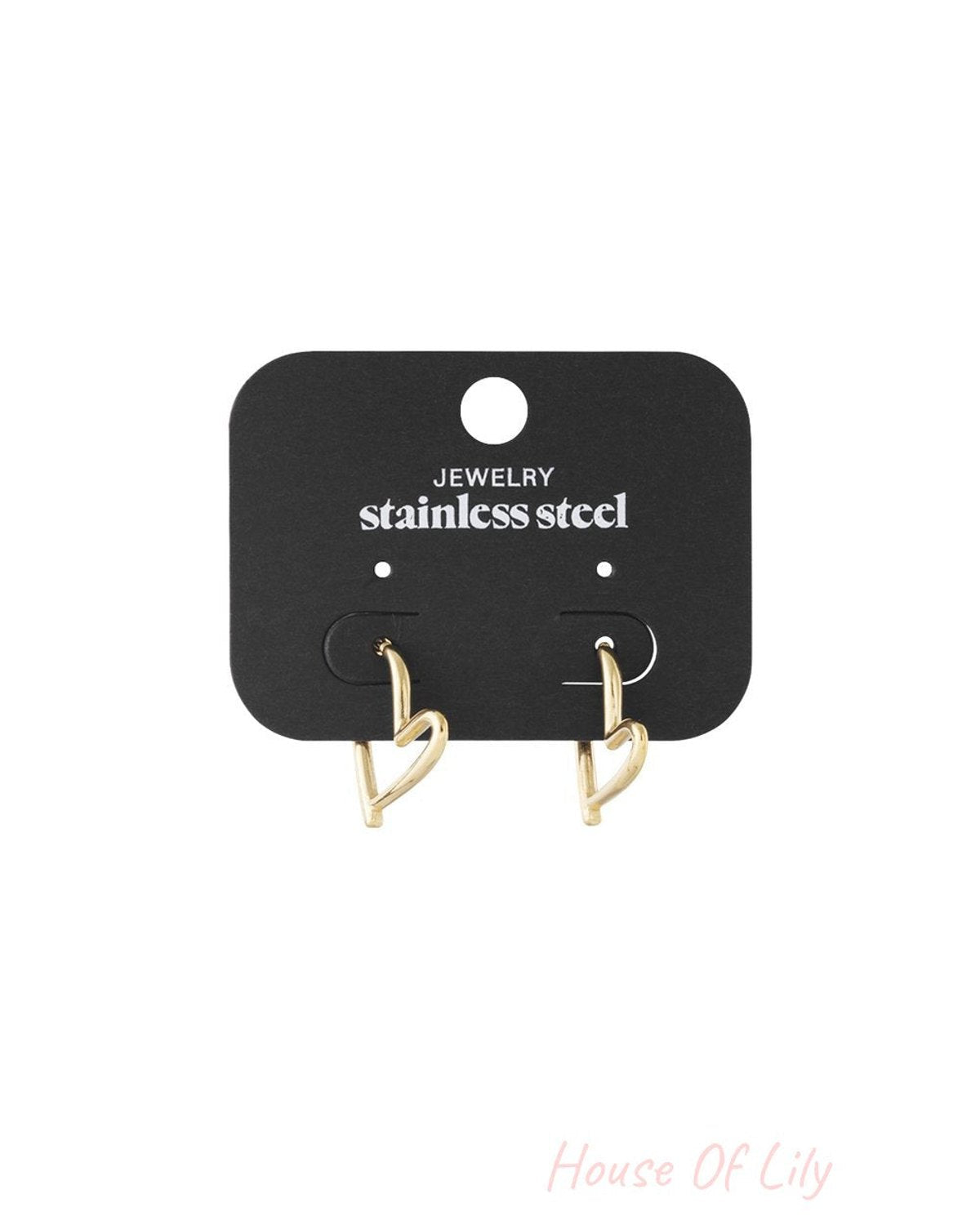 Gold-toned stainless steel heart-shaped hoop earrings on a black display card.