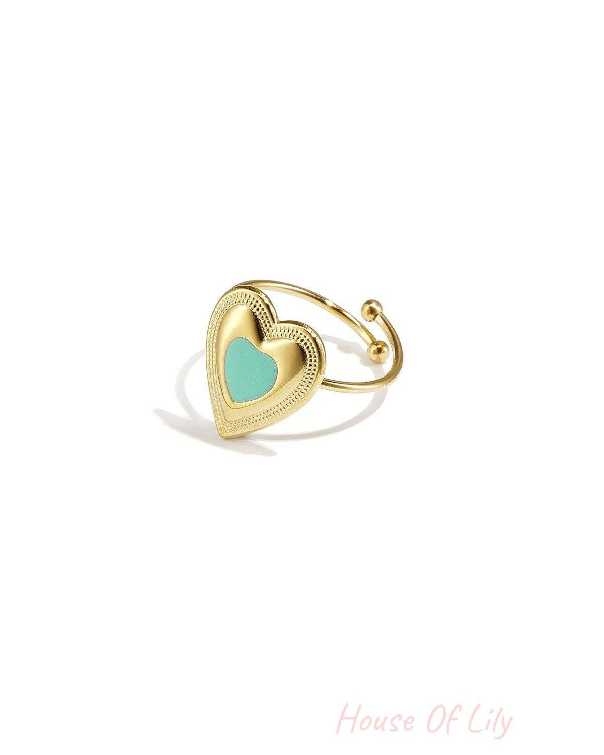 Adjustable statement ring with colored heart