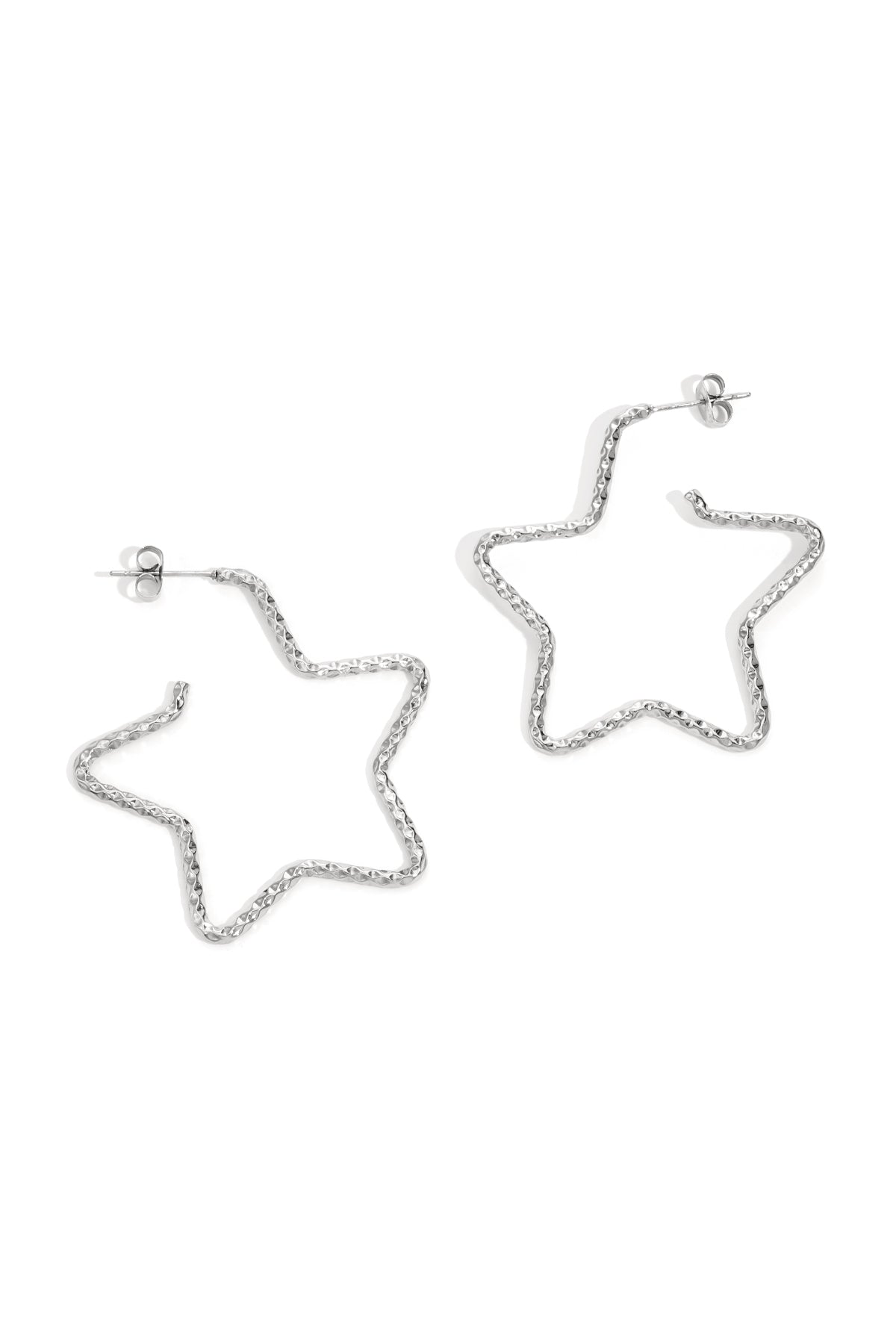 Silver star-shaped textured hoop earrings displayed on white background