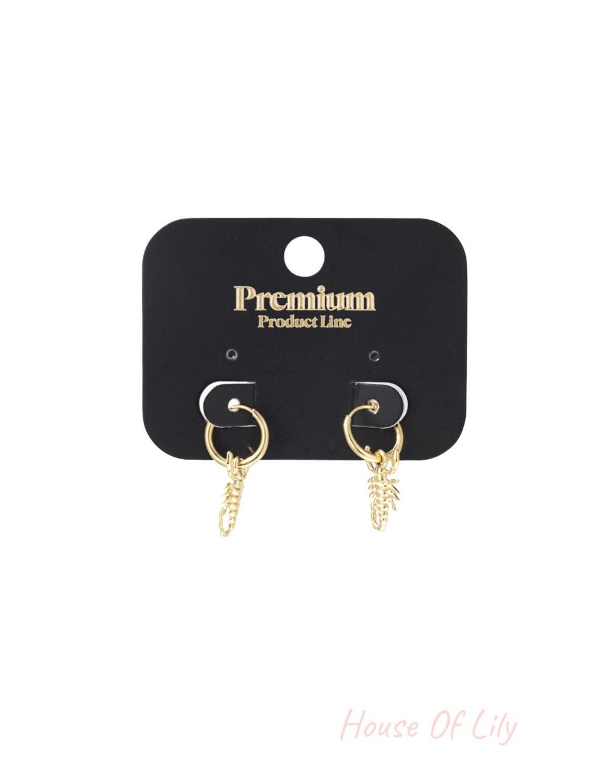 Gold hoop earrings featuring small, detailed scorpion charms on a black Premium Product Line display card.