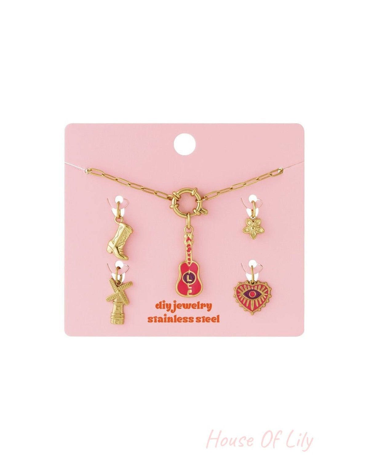 Main Character Hearts: Gold-tone stainless steel chain necklace and charms, including pink guitar and evil eye heart.
