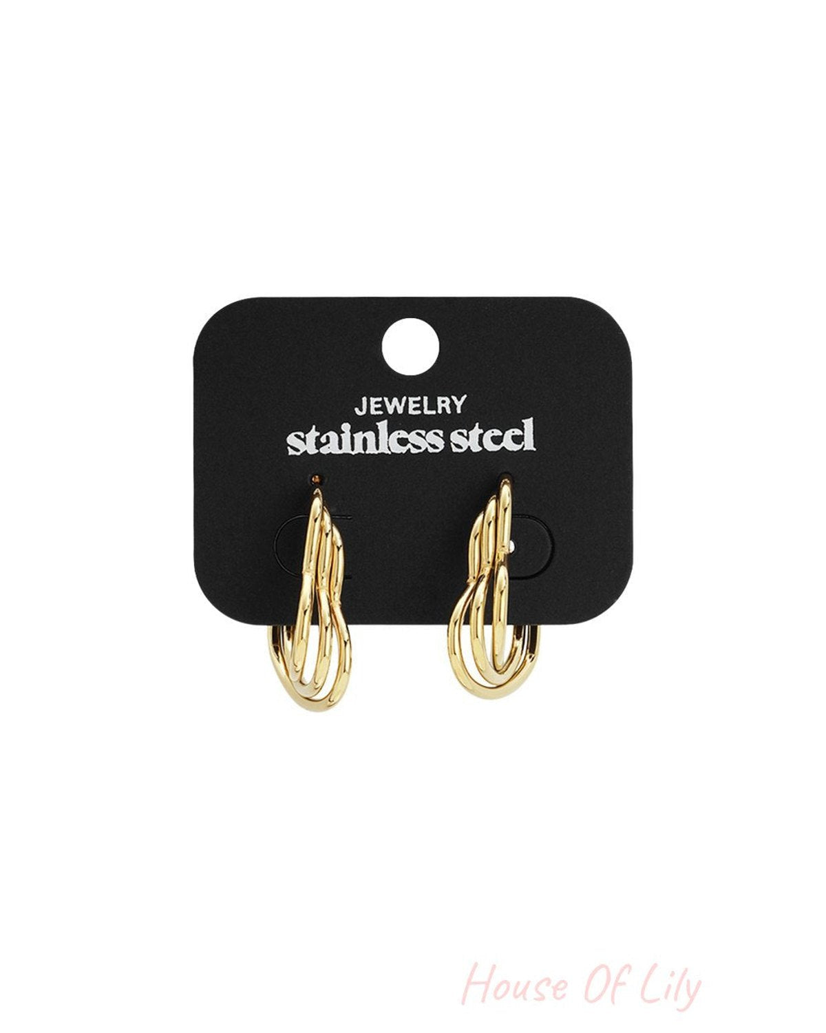 Coquette Puff gold stainless steel hoop earrings with a tiered, multi-loop sculptural design on a black display card.