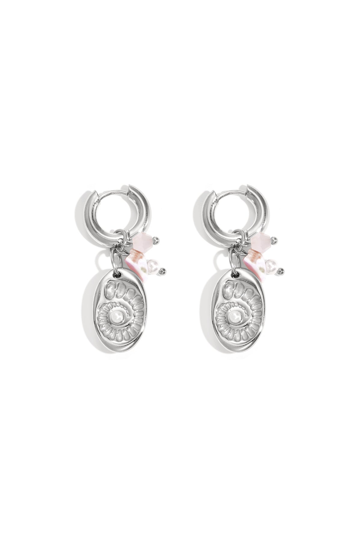 Pair of silver-tone drop earrings featuring a shell medallion charm and pink bead accents on white background