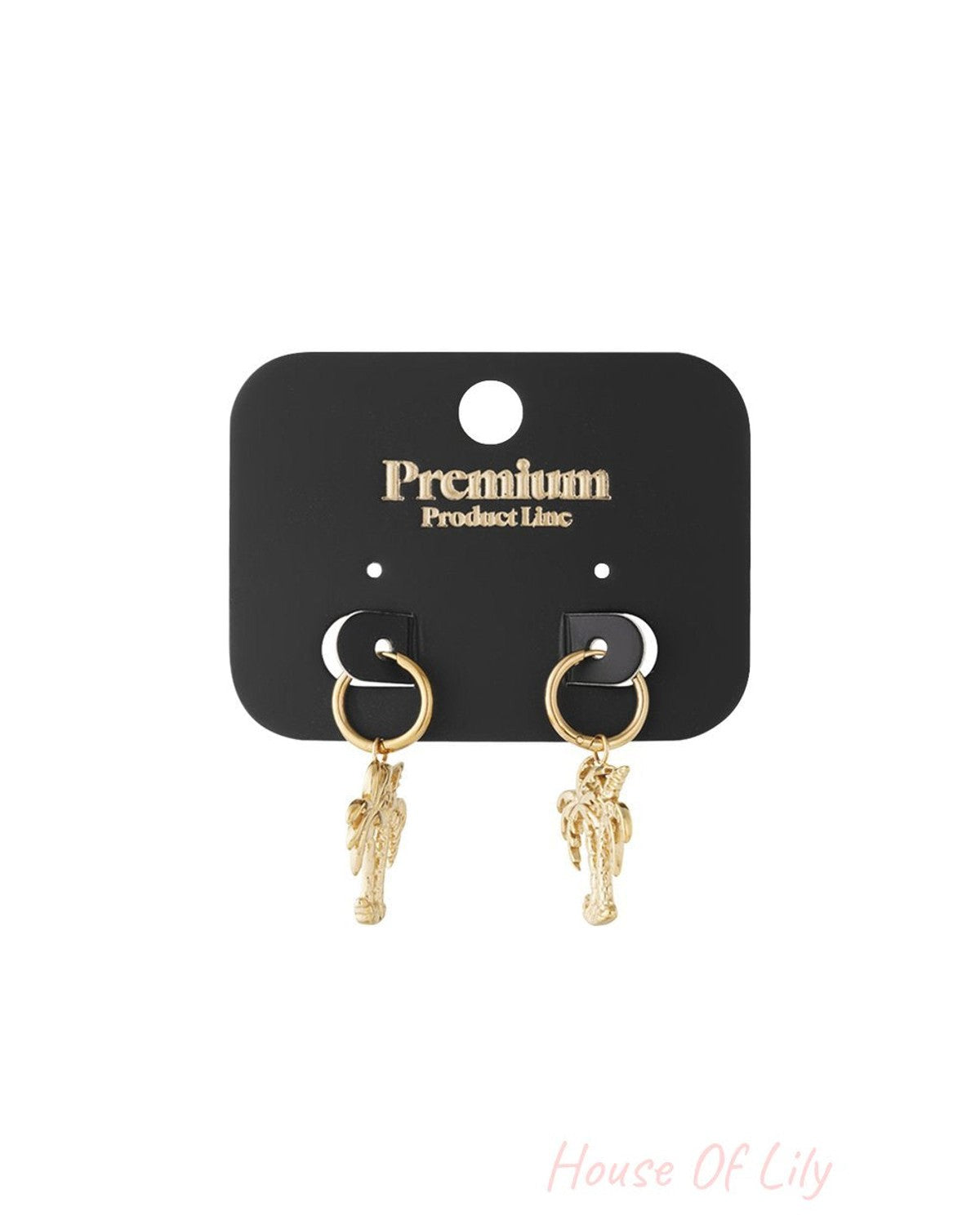 Gold hoop earrings with palm tree charms on a black display card.