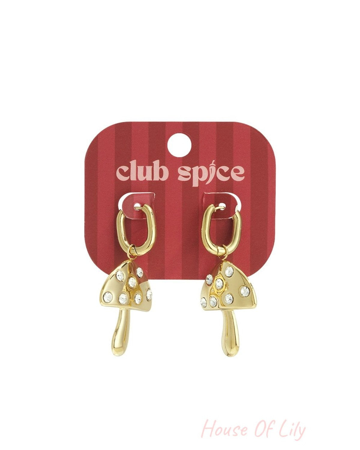 Gold-tone hoop earrings with dangling, crystal-studded mushroom charms on a red striped display card.