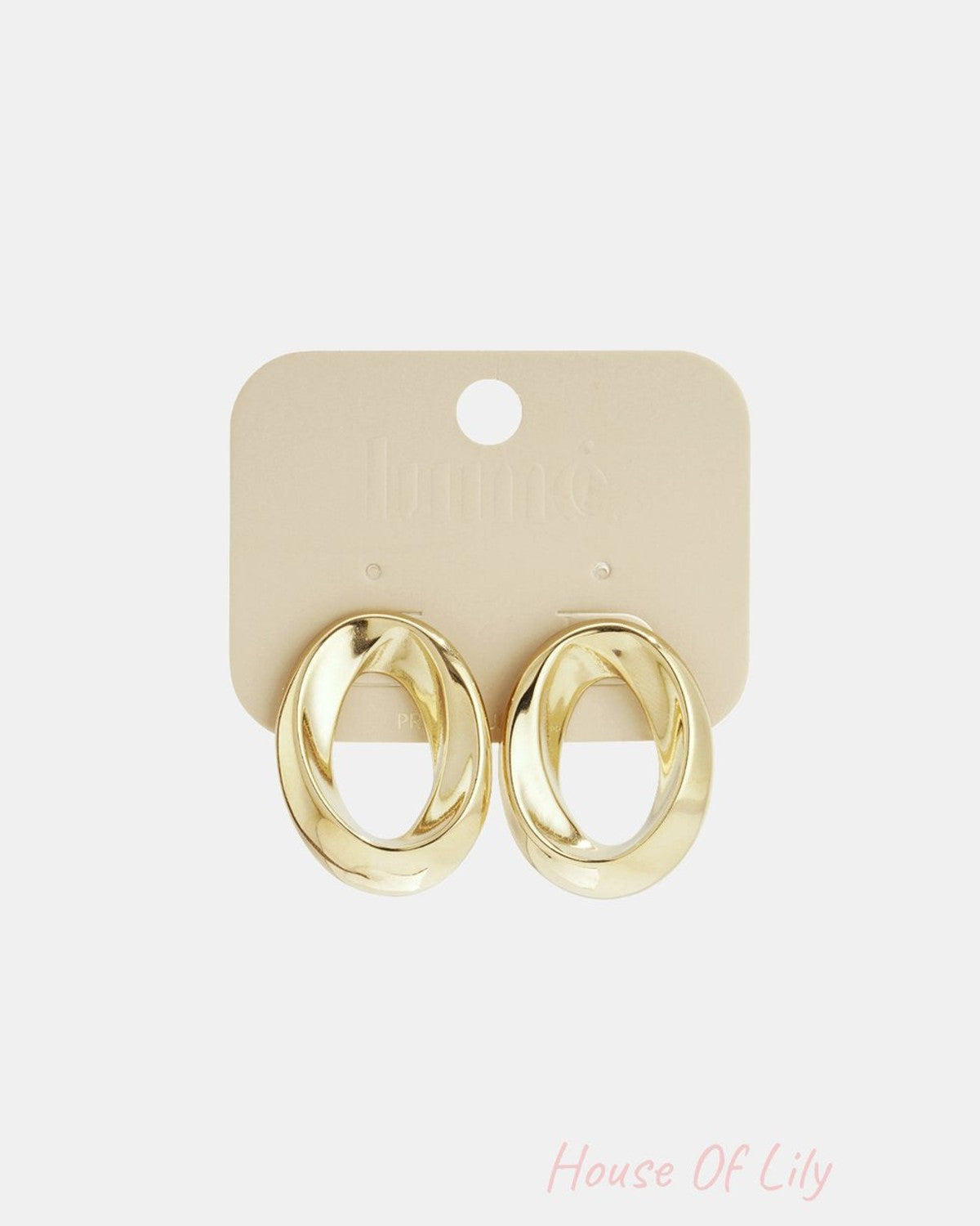 Gold-tone Spiraled Vibe hoop earrings with a thick, twisted oval design on a beige jewelry display card.