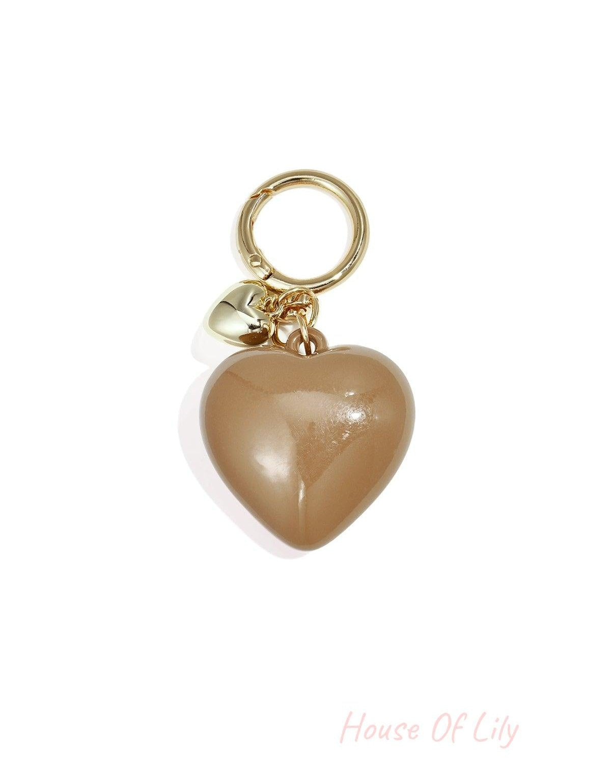 Glossy warm taupe heart-shaped acrylic bag charm with gold alloy ring and tiny heart charm