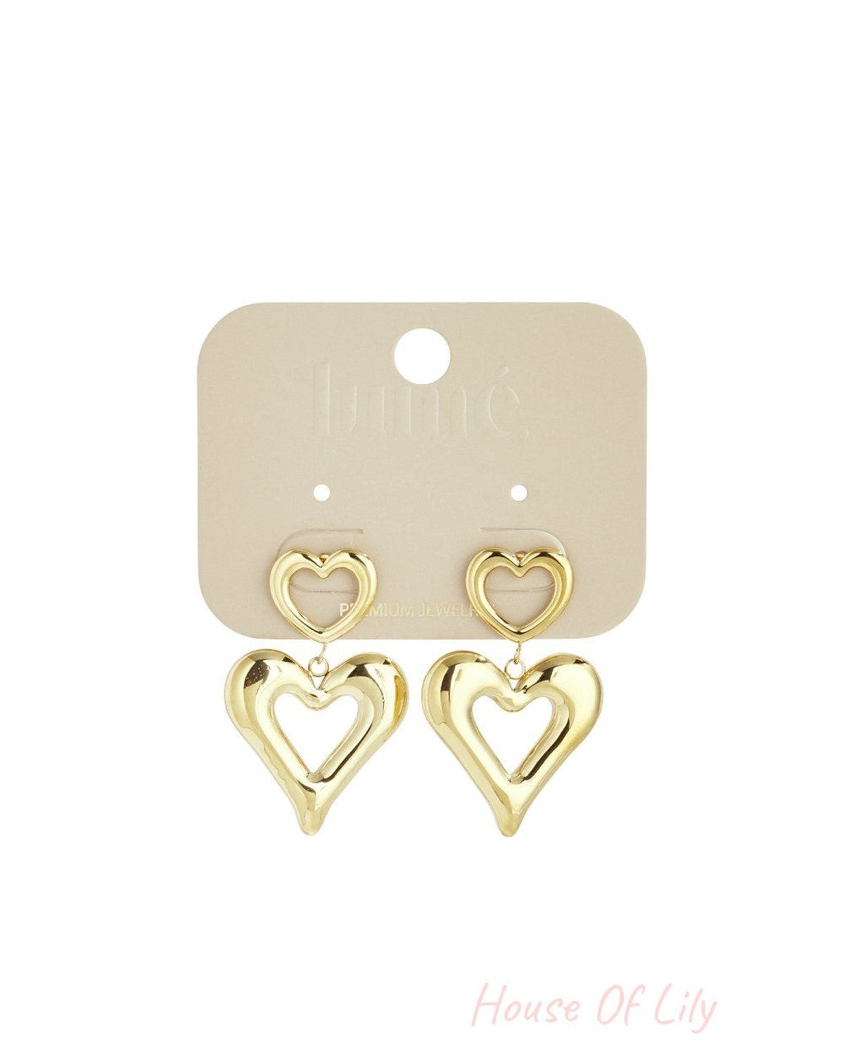 Gold-tone Double Heart Drop earrings featuring polished, cutout heart pendants on a display card.
