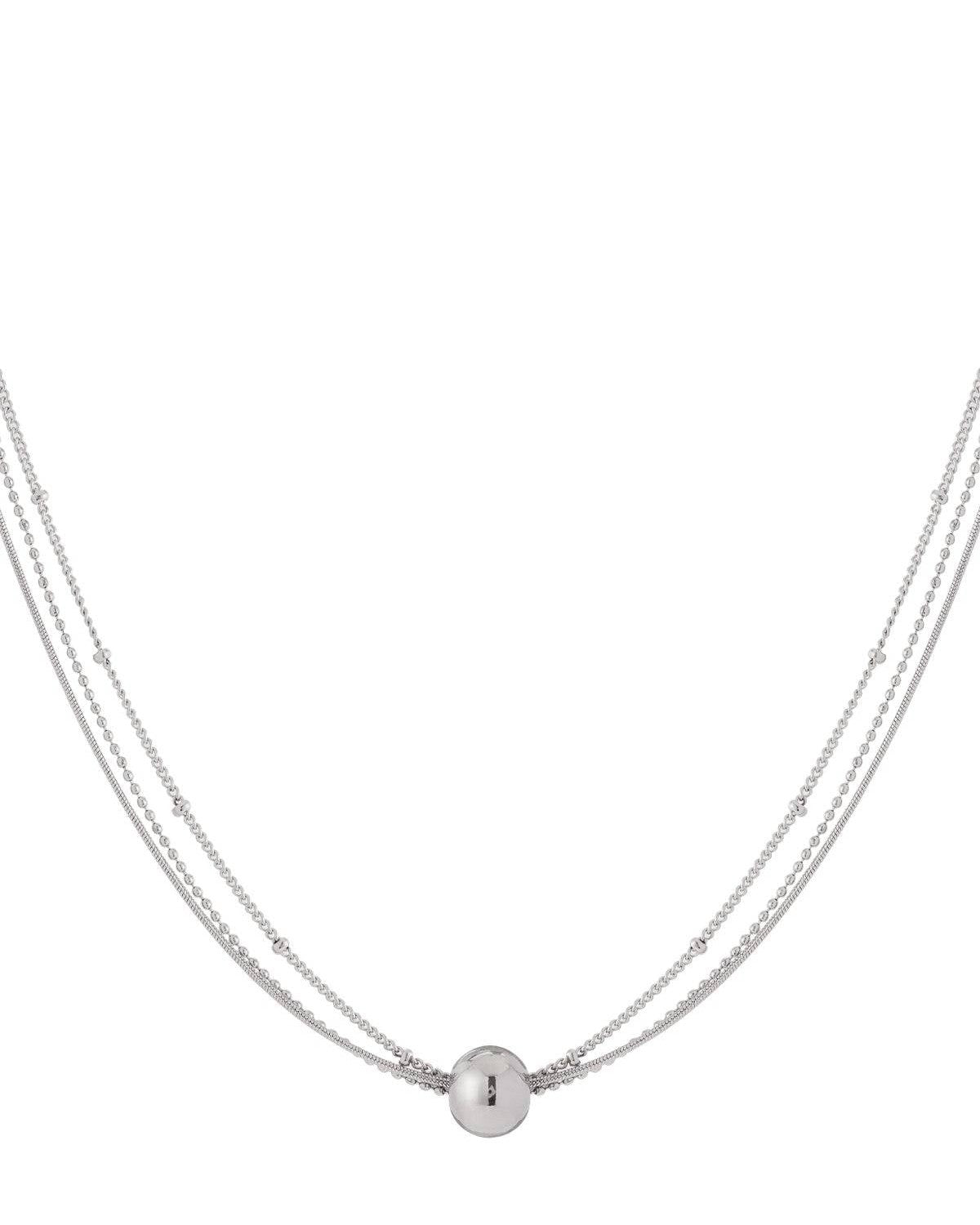 Silver layered necklace with tiny beads and a smooth spherical pendant displayed on a white background
