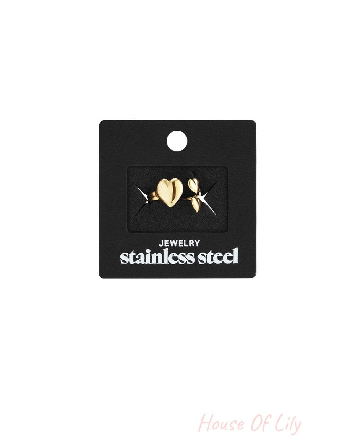 Gold-tone stainless steel Triple Heart Drip ring featuring three heart-shaped charms on a black display card.