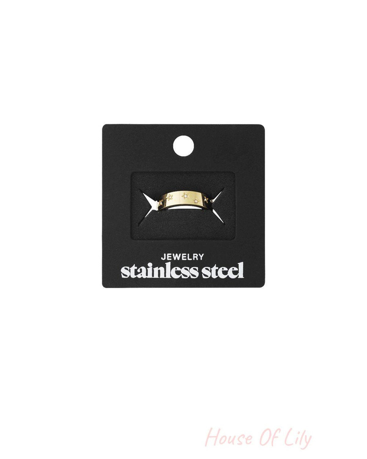 Little Stargazer Ring: A gold-tone stainless steel band featuring delicate cutout star motifs, displayed on a card.