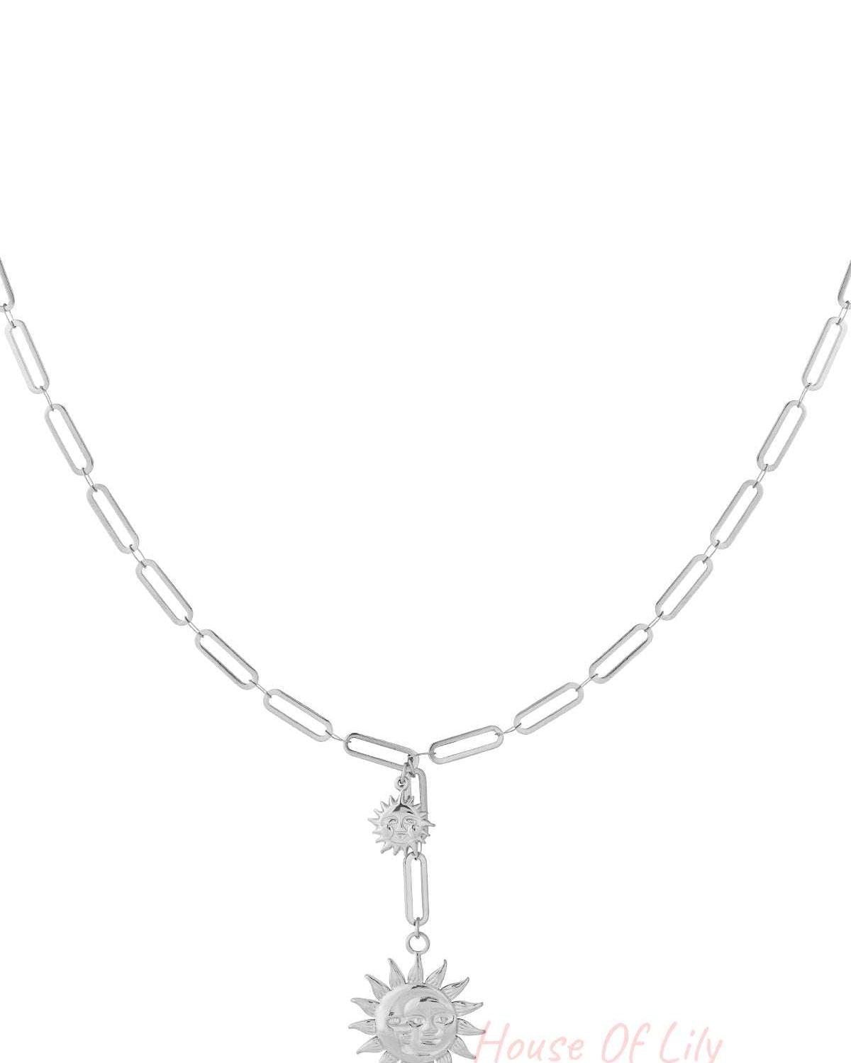 Silver dual sun pendant necklace with elongated chain links on white background