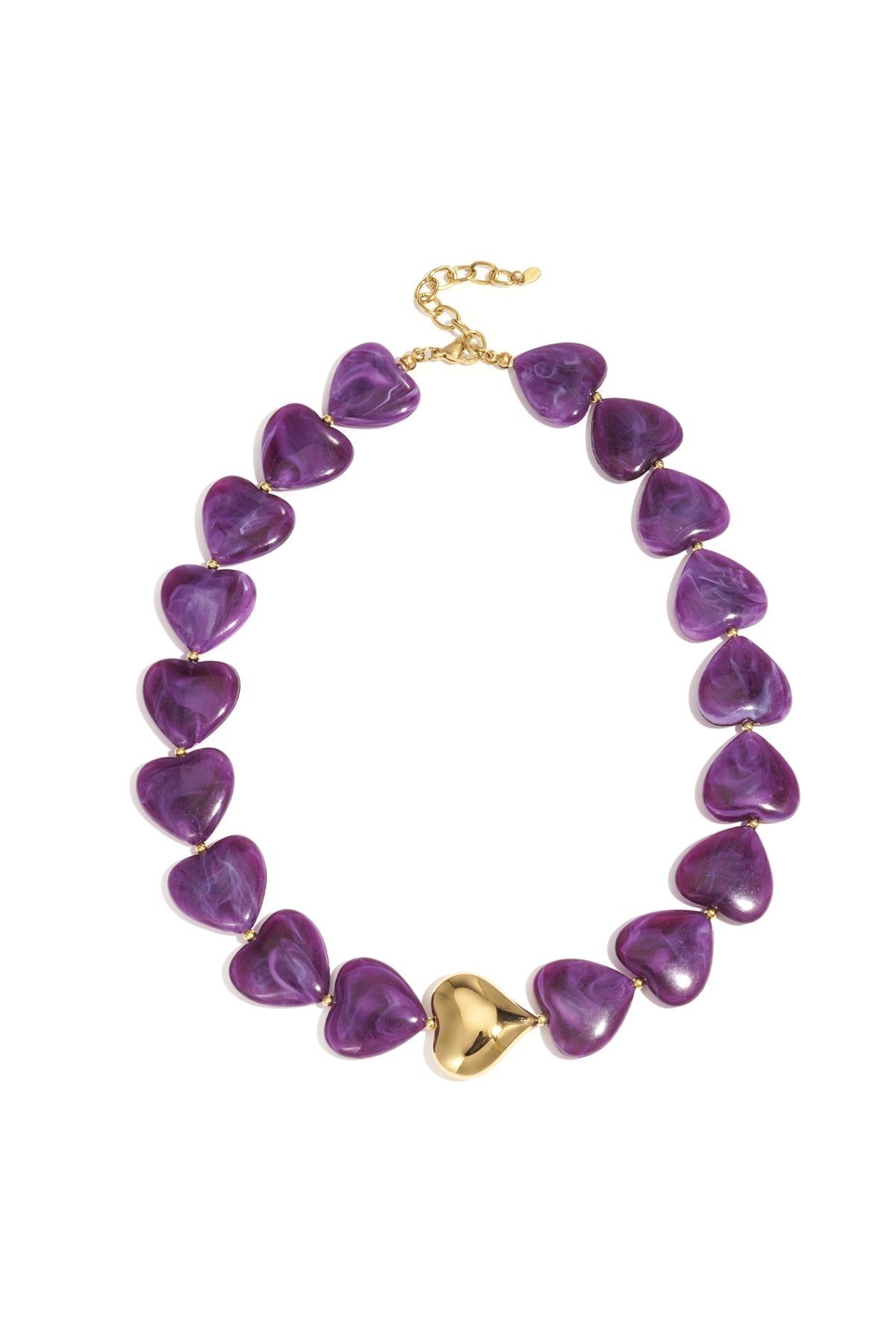 Close-up of purple marbled heart bead necklace with shiny gold heart centerpiece, isolated on a white background