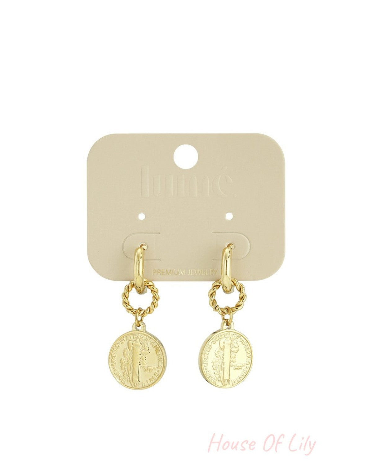 Gold vintage coin hoop earrings with a twisted metal link, displayed on a branded beige jewelry card.