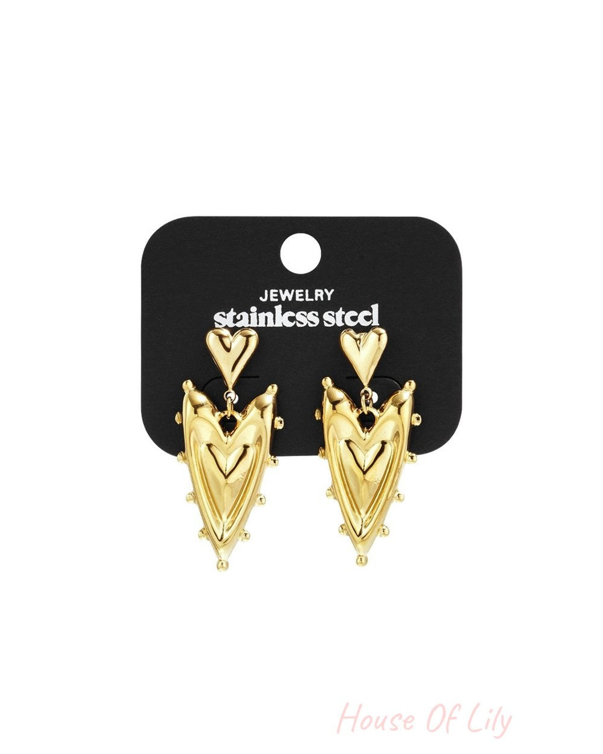 Golden Heart Glow gold-tone stainless steel drop earrings featuring textured heart charms on a black display card.
