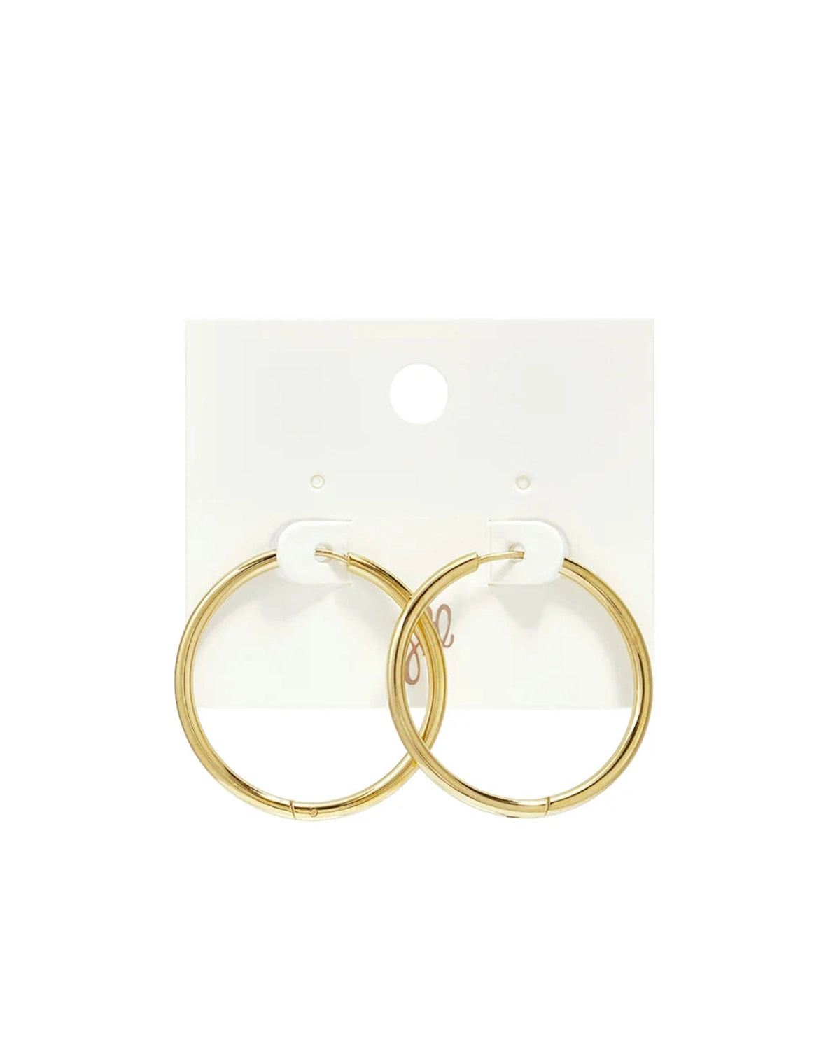 Gold hoop earrings mounted on a white display card.
