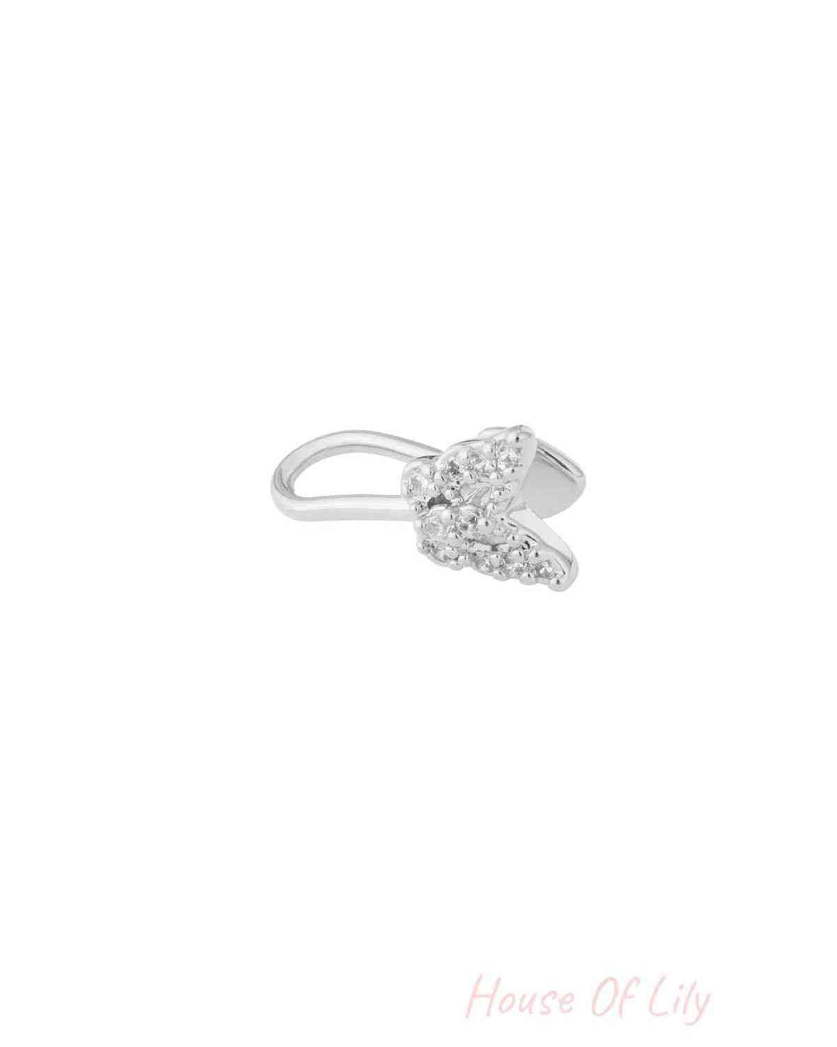 Silver-tone butterfly nose and ear cuff with clear zircon accents photographed on white background