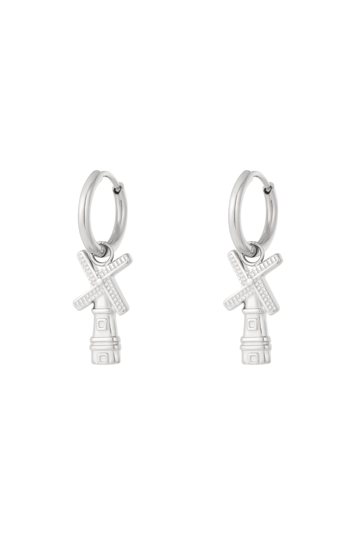 Pair of silver windmill charm hoop earrings with detailed blades on white background