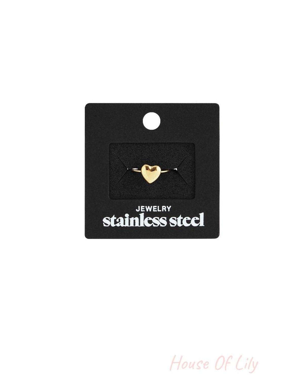 Little Heart Crush gold-tone stainless steel heart ring on a black display card.