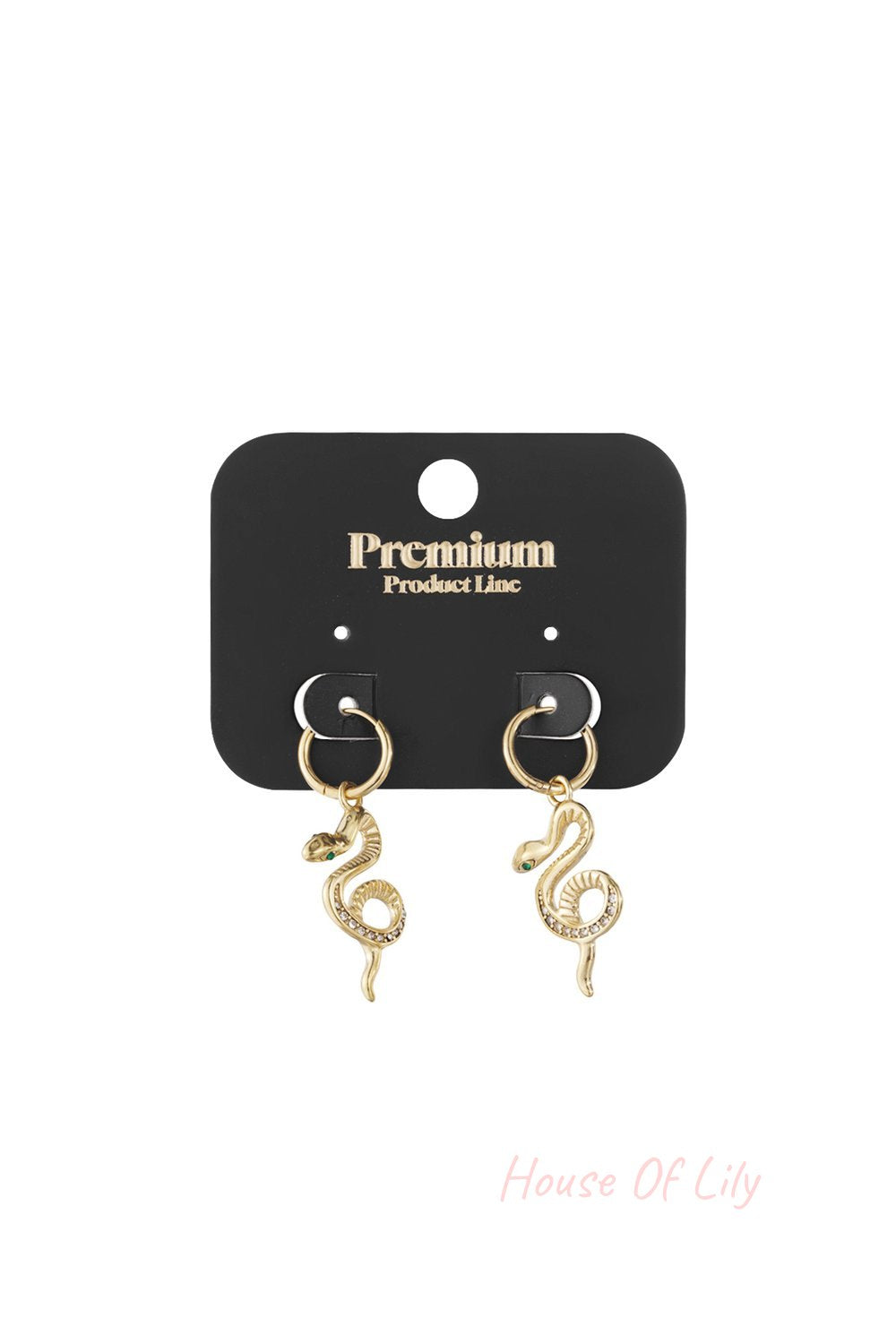 Gold hoop earrings featuring dangling snake charms with crystal-accented bodies and green stone eyes on a black card.
