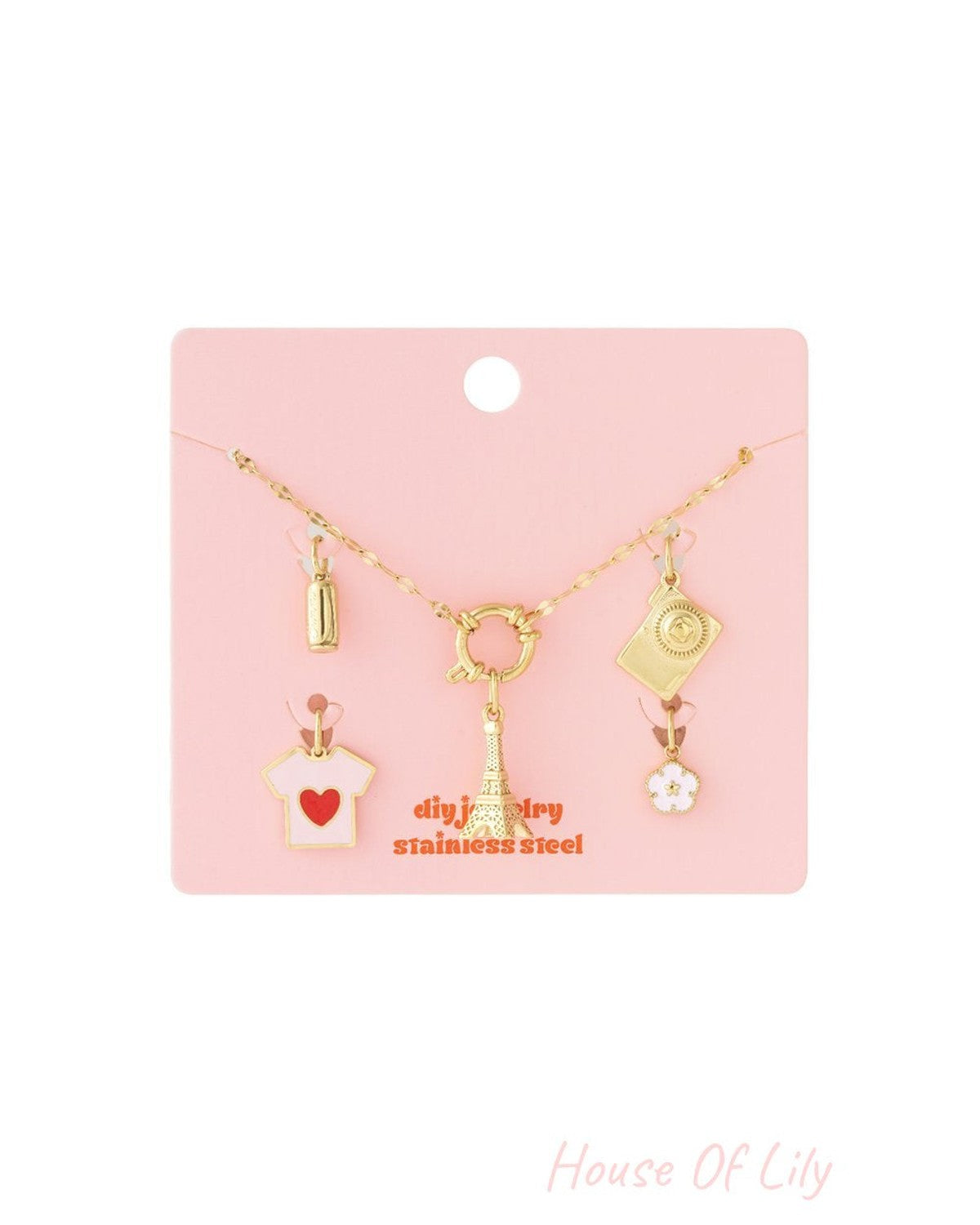 Parisian Main Character gold stainless steel charm necklace featuring Eiffel Tower, t-shirt, camera, and flower charms.