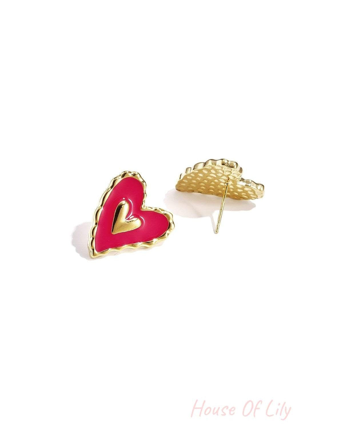 Puffy Heart Vibes earrings featuring hot pink heart-shaped enamel with a central gold heart and scalloped gold edges.