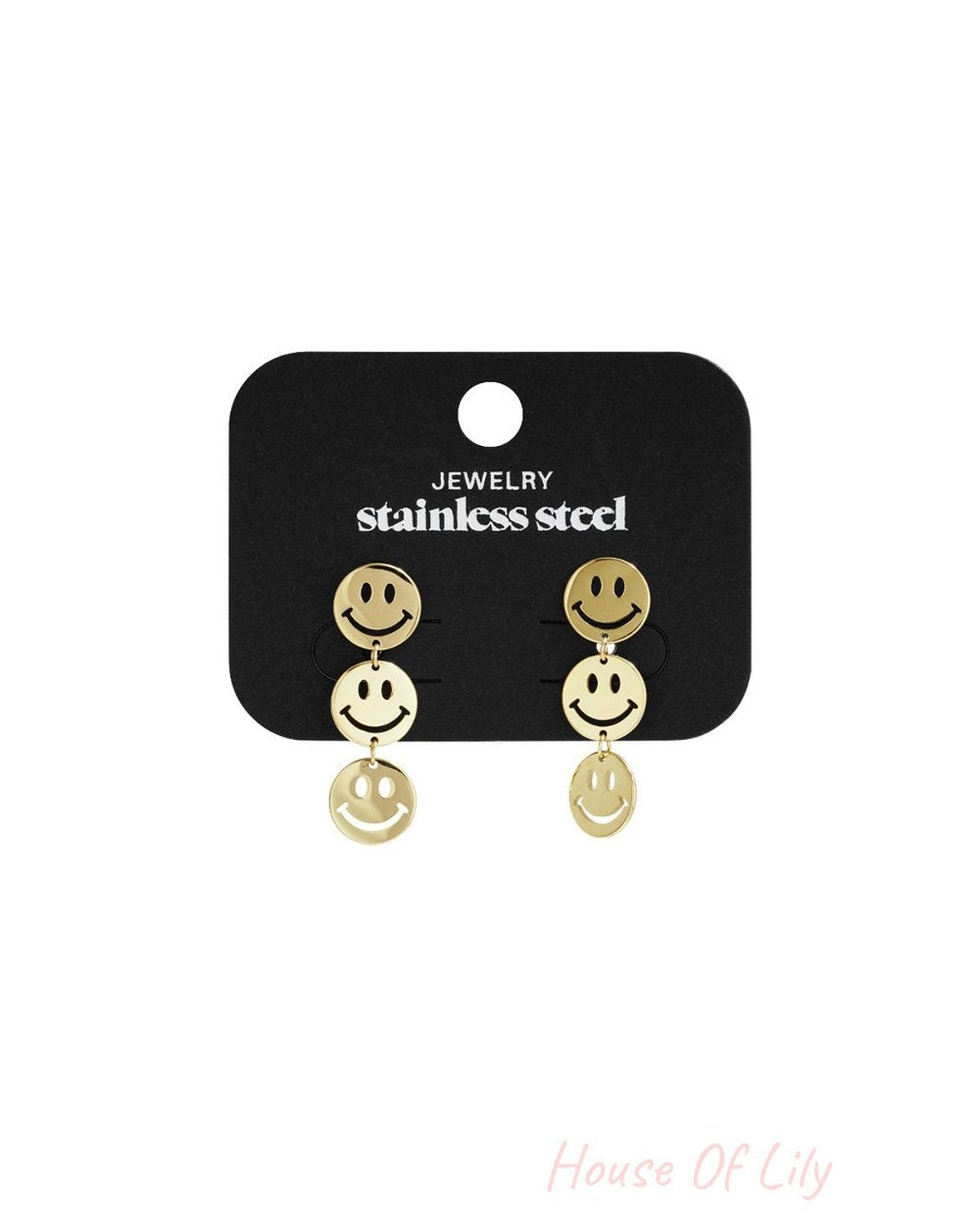 Gold-tone stainless steel dangle earrings featuring three stacked smiley face charms on each.
