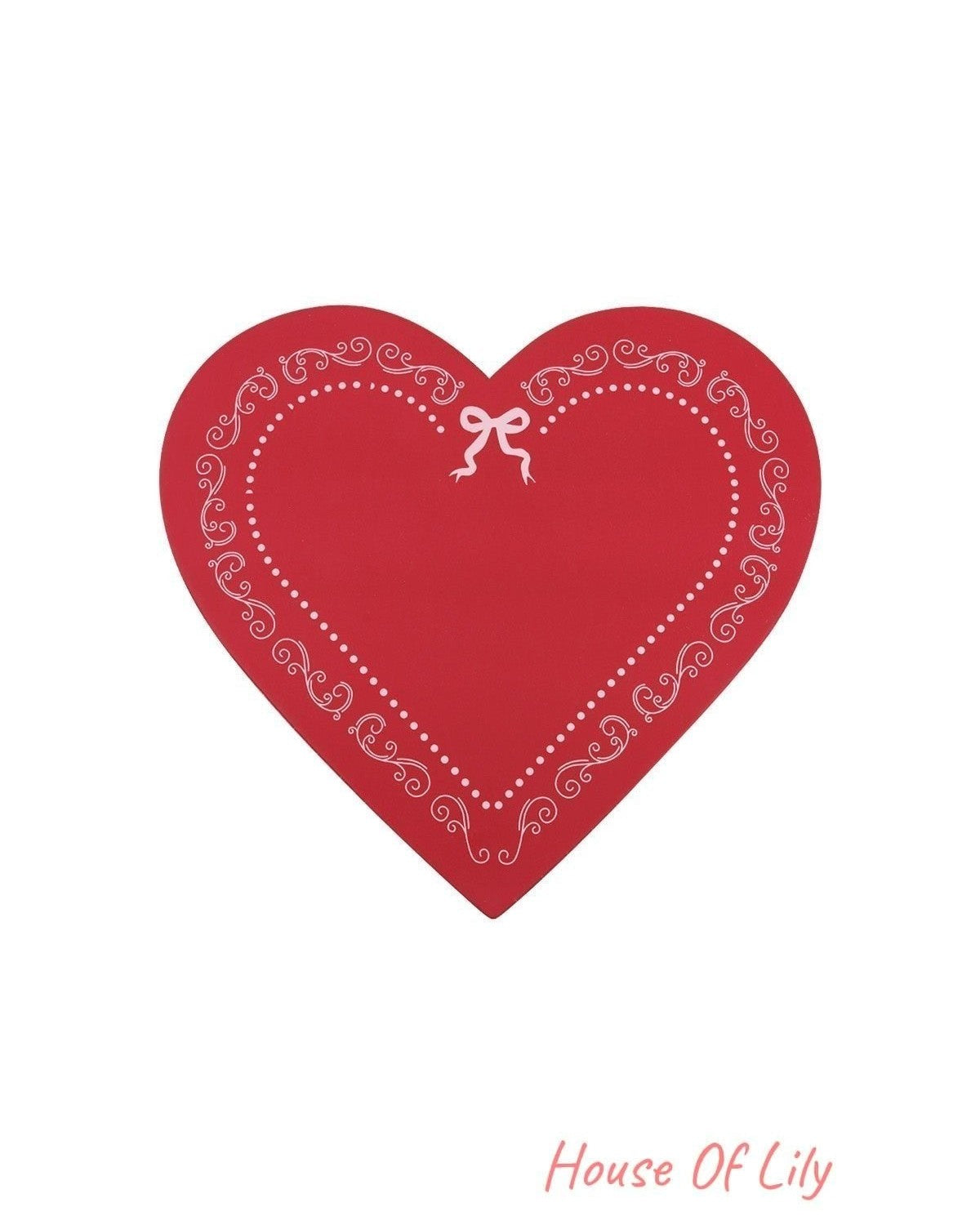 Red heart-shaped gift box lid with white decorative border and ribbon design