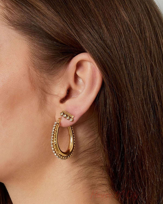 drop shaped earring with stones with balls