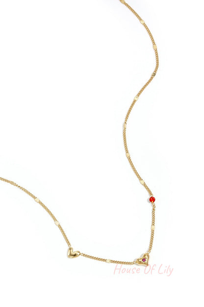 Necklace with hearts stones and pattern