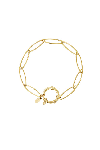 Gold link bracelet with elongated textured chain links and round toggle clasp on white background