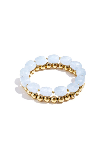 Mint green marbled acrylic beaded bracelet with shiny gold-tone beaded bracelet on white background