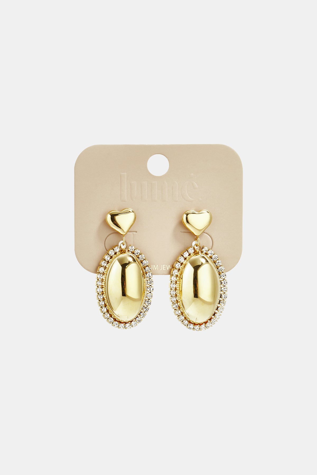 Gold oval drop earrings with crystal-encrusted borders and heart-shaped studs on a Lume jewelry display card.