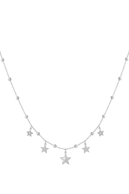 Silver star charm pendant necklace with small beads on chain, isolated on white background