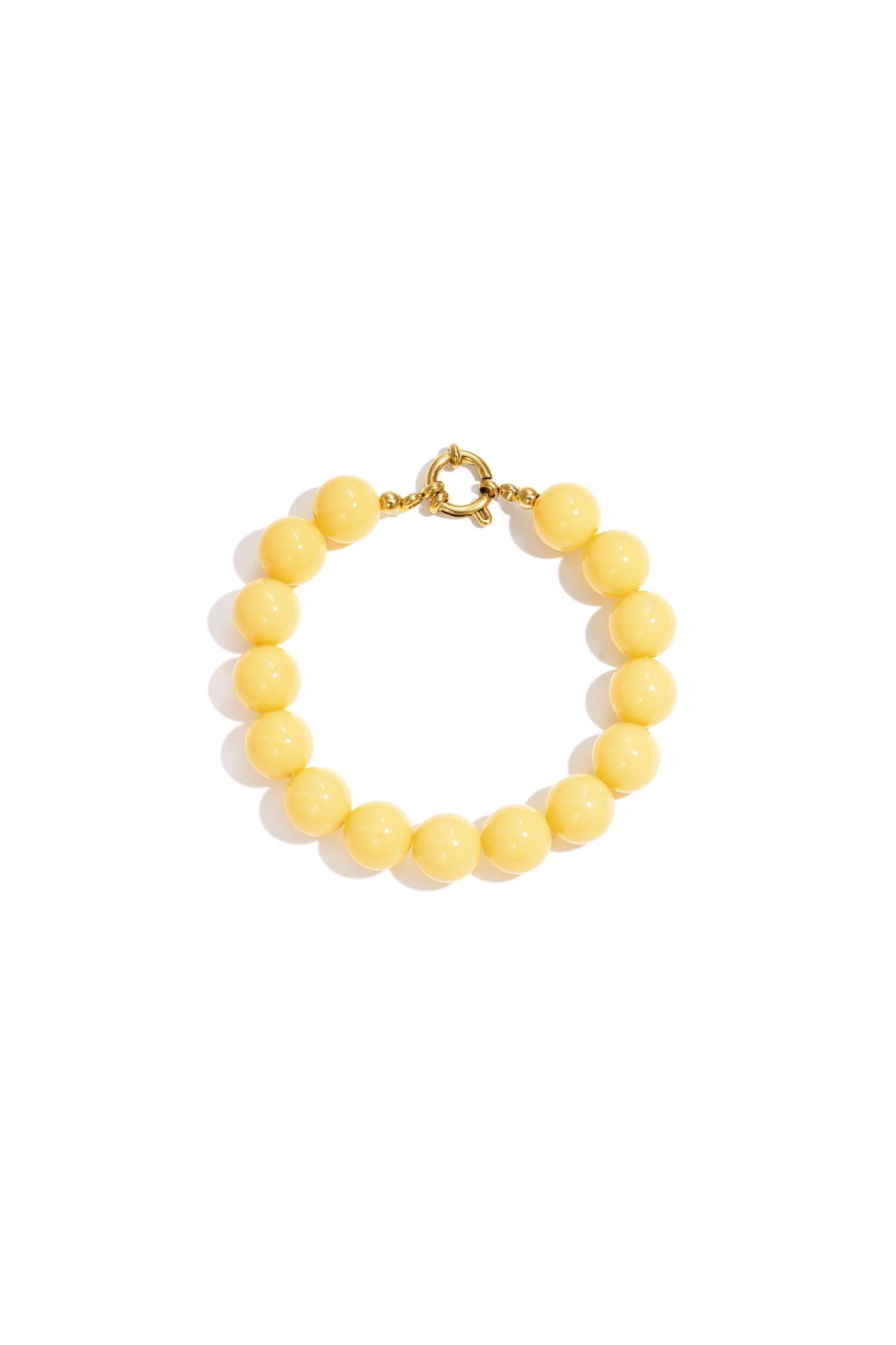 Vibrant yellow resin bead bracelet with a gold-tone circular clasp, centered on a white background.