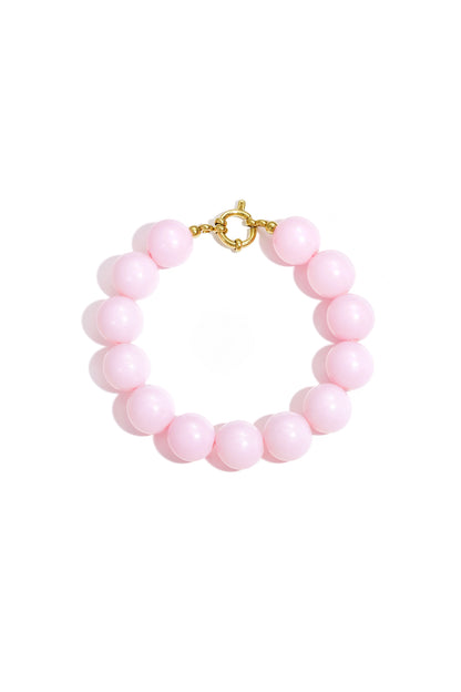 Light pink chunky beaded bracelet with polished resin beads and gold-tone clasp