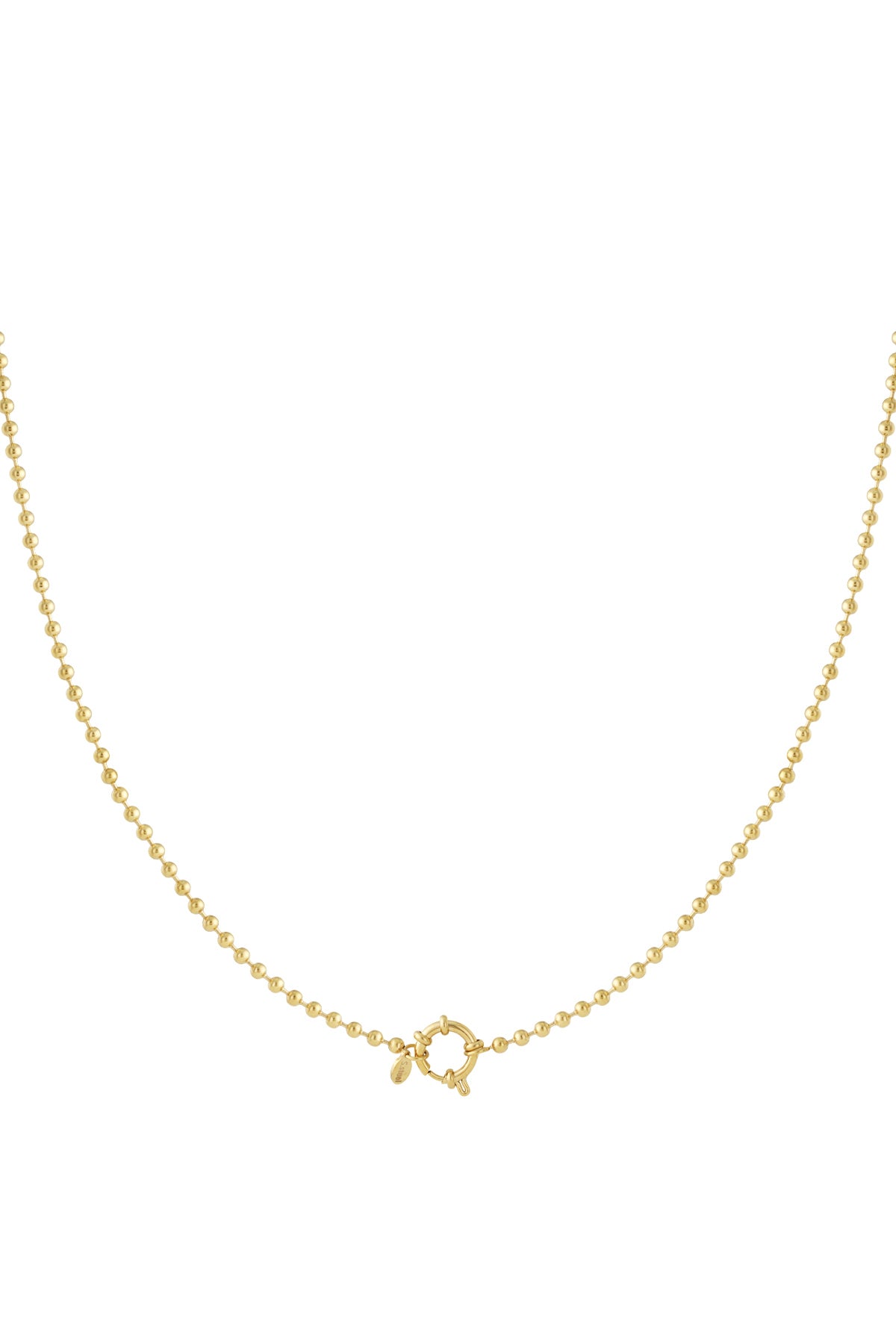 Close-up of a gold bead chain necklace with circular toggle clasp on white background
