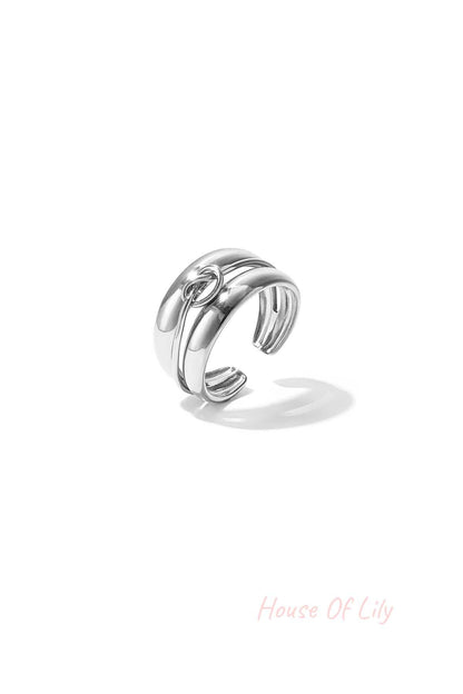 Layered ring with minimalist twisted detail