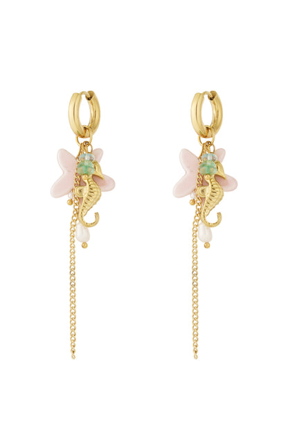 Pair of gold-tone hoop dangle earrings featuring a seahorse charm, pink starfish, pearl drops, and a delicate chain.