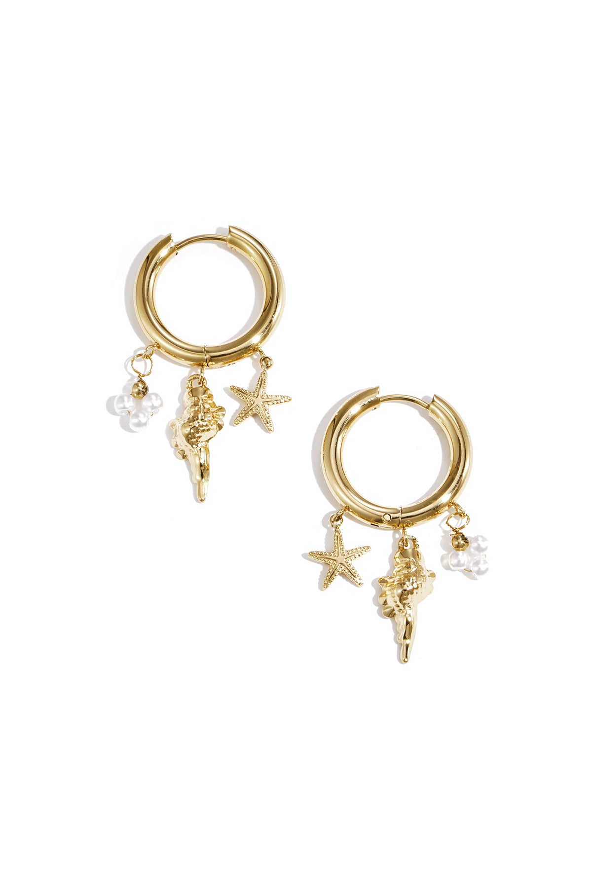 Pair of gold-plated hoop earrings with dangling starfish, seashell, and pearl charms on white background